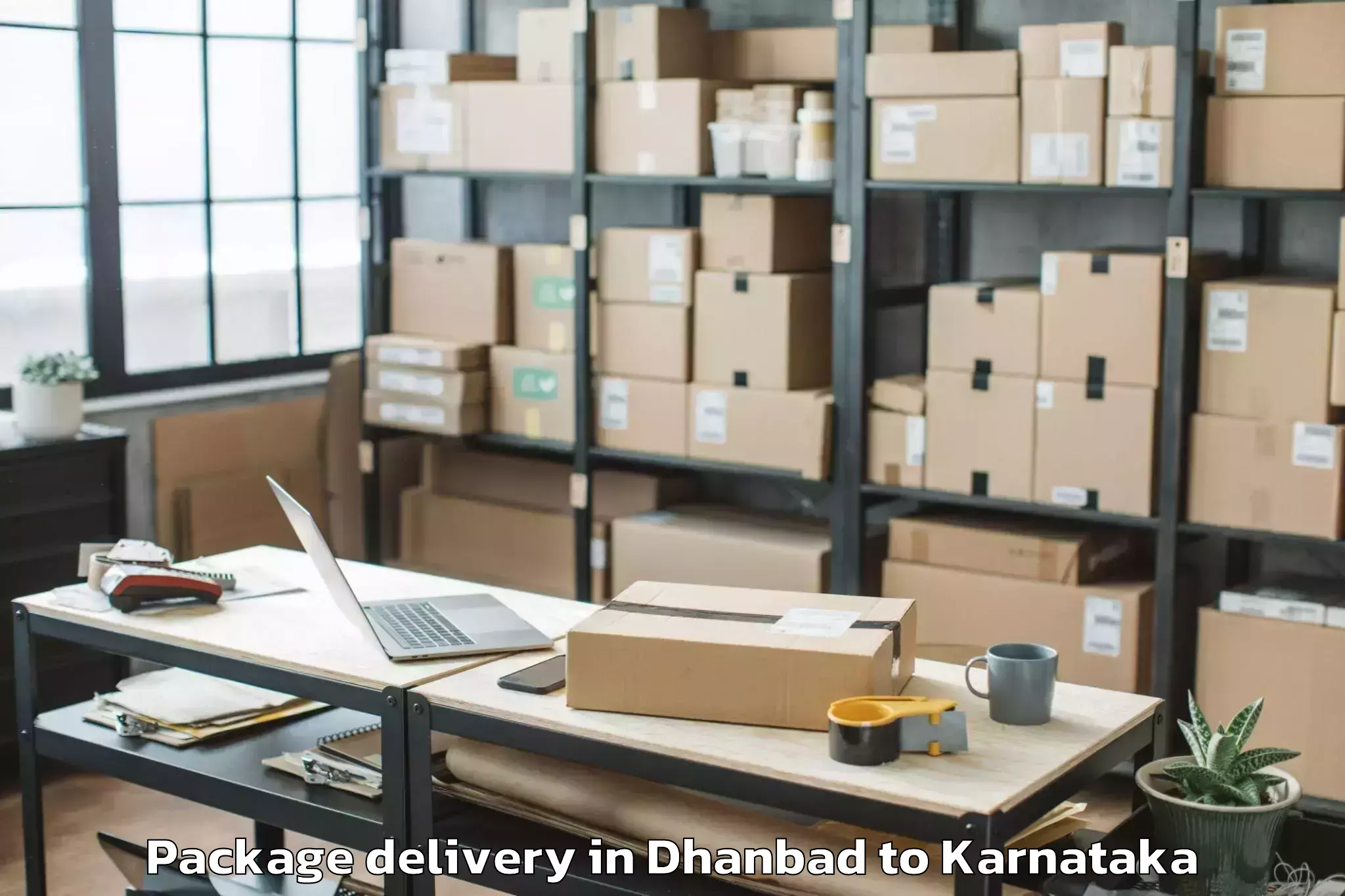 Top Dhanbad to Dasarahalli Package Delivery Available